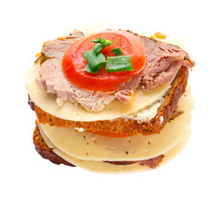 Sandwich with roast pork, cheese and tomato