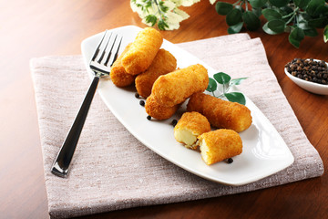 Fried potato croquettes - 49489338