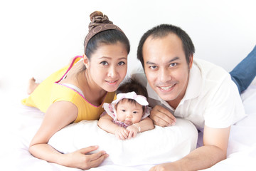 Happy of a new family on white background