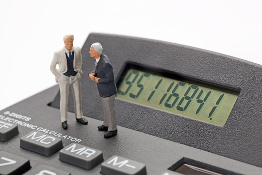 financial discussion around a calculator