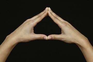 woman hands isolated on black background