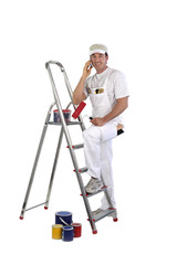 Male decorator with step ladder