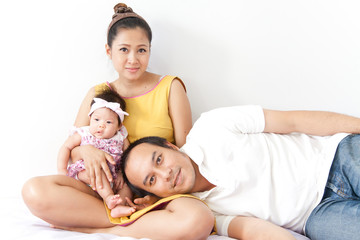 Happy of a new family on white background