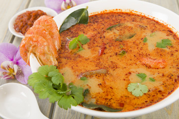 Tom Yum Nam Khon - Creamy Thai soup with prawns and mushrooms.