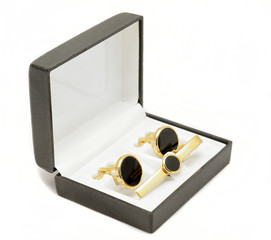 male fashion accessories: black box with cufflinks and tie pin