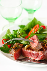 Grilled beef steak and salad.