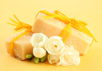 Natural handmade soap, on yellow background