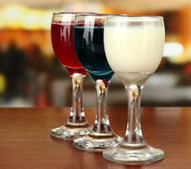 Tasty color liquors, on bright background