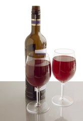 red wine in bottle and glasses
