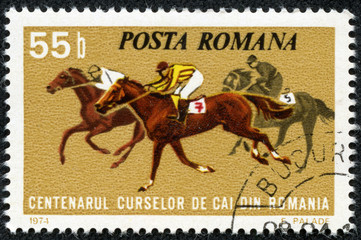 stamp printed in Romania shows horse races