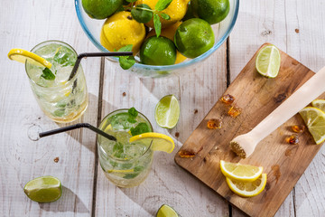 Cold drink with fresh citrus fruit