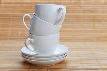 coffee cups with saucers