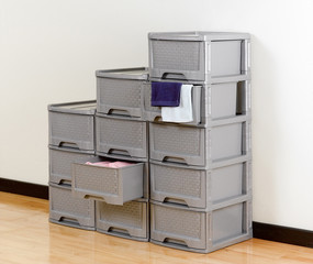 Stacks of plastic drawers for home or office using