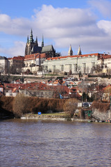 Naklejka na ściany i meble Winter Prague gothic Castle above River Vltava, Czech Republic