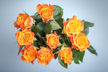 Bouquet of red and yellow roses flowers top view