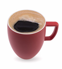 Delicious coffee is poured into a red cup