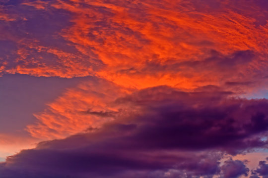 Dramatic storm clouds at sunset © sas
