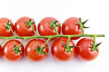 Close Up of cherry tomatoes on the vine