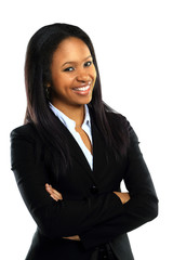 Successful young business woman with hands folded smiling