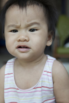 funny face of asian baby