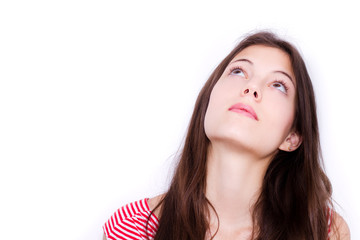 Fototapeta premium closeup of a young woman looking up - isolated