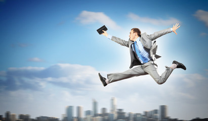 Image of running businessman