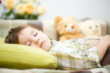 Cute little boy is sleeping