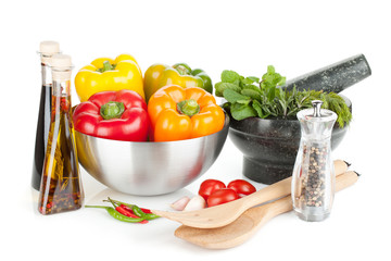 Fresh bell peppers, herbs and condiments