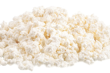 Fresh cottage cheese (curd) heap, isolated on white background .