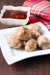 Meatballs and plum chutney