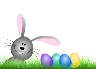 Grauer Hase im Gras mit Eiern