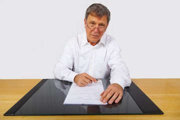 business man sitting at his desk