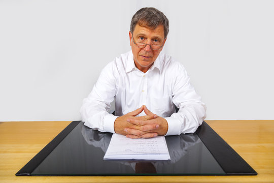 business man sitting at his desk