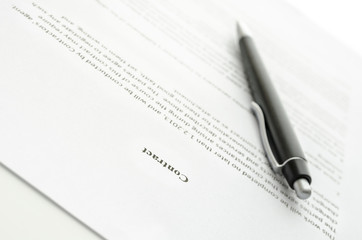 A contract and a pen