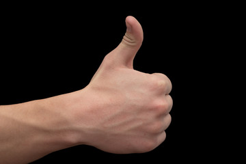 man's hand on a black background