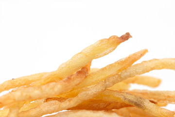 French fries on a white background. macro