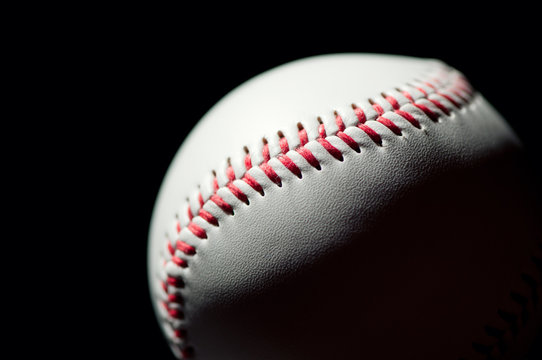 Studio shot of a baseball ball, black background