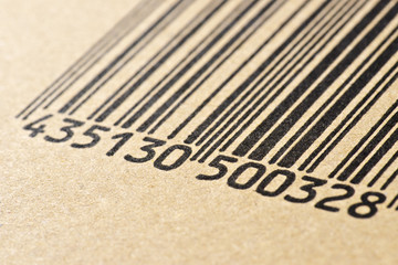 barcode printed on a cardboard box, making macro
