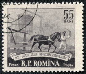 stamp printed by Romania, shows Horse pulling drill