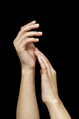 Woman s beautiful hands on black background