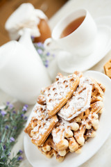 composition with cookies and a cup of tea