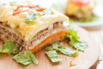 traditional Vegetable lasagna on a wooden board