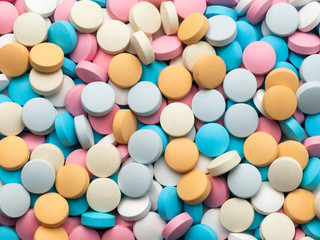 Many multi-coloured pills.