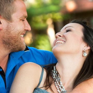 In love couple smiling at each other.