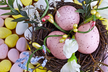 EASTER EGGS IN BASKET AND CANDY WITH DECORATION