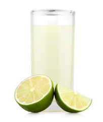 Glass of lime juice with lime half