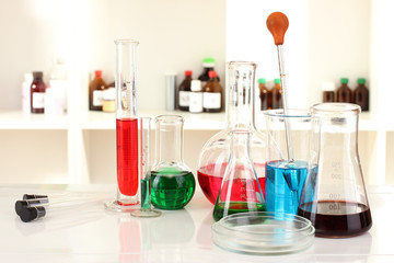 Different laboratory glassware with color liquid