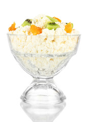 Cottage cheese in glass bowl with fruits, isolated on white