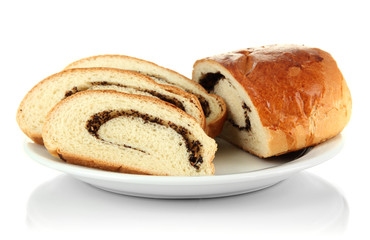 Loaf with poppy seeds on color plate, isolated on white