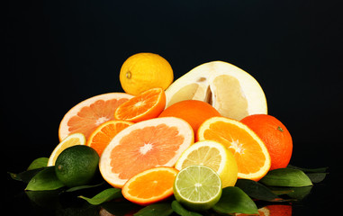 Lots ripe citrus isolated on black